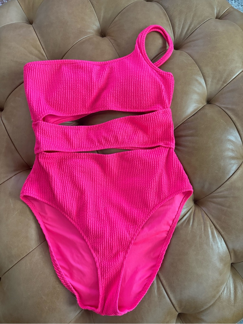 Hot pink one piece swimsuit.
